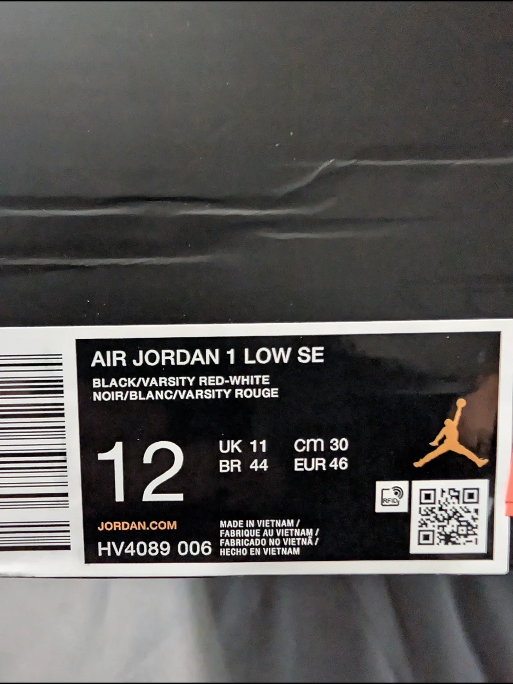 Jordan Men's Low-Top Sneaker in Red and Black